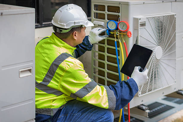 Professional Air Duct Cleaning technician working in Ashland, MA